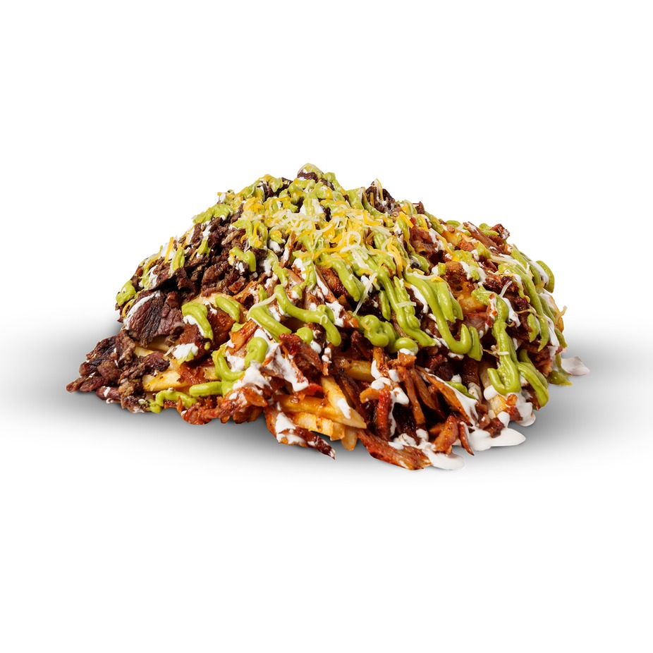 Loaded asada fries with melted cheese, guacamole drizzle and crema
